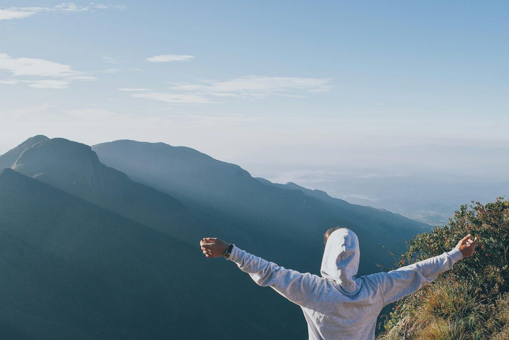 Experience the serenity of sunrise from a mountain peak in Sri Lanka, perfect for nature lovers.